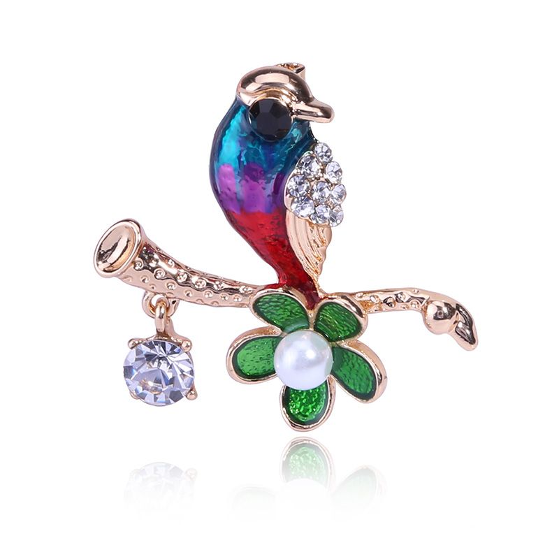Bird brooches with pearls are sold by manufacturers