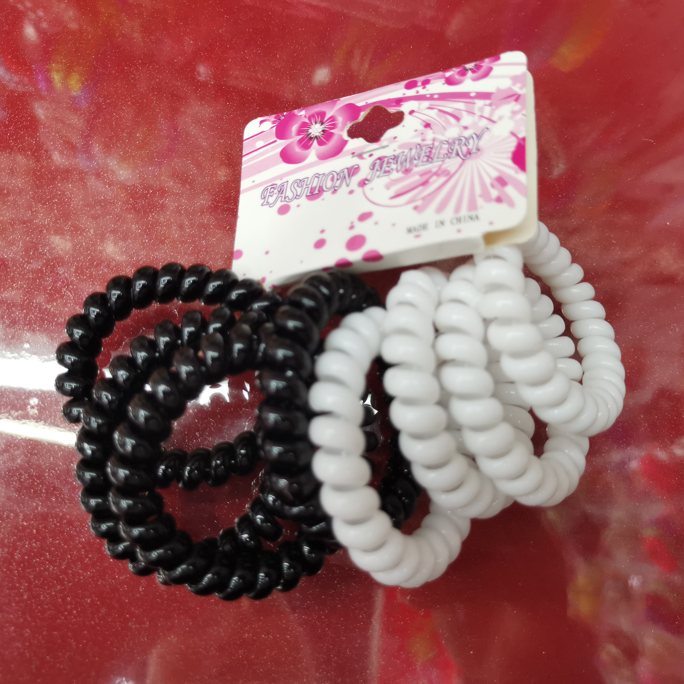 There are 100 large wristbands in one package