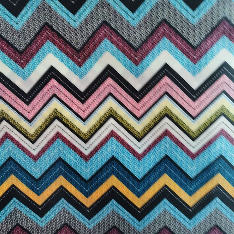 The color-printed series features geometric stripes on 100% polyester fabric with PVC foam at the bottom Specification image