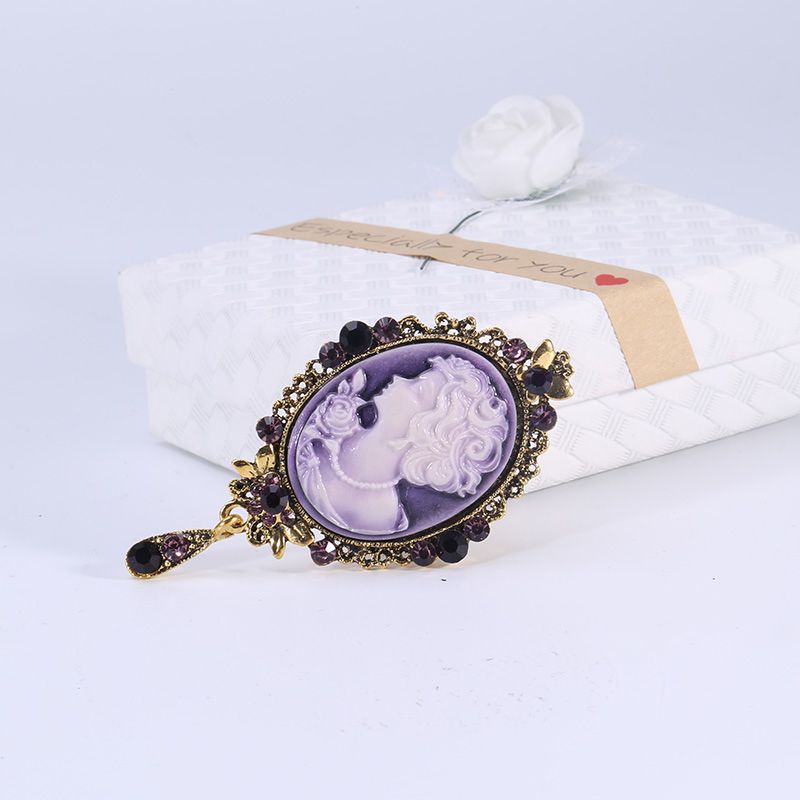 Manufacturers direct sales of beauty head hanging spike brooch