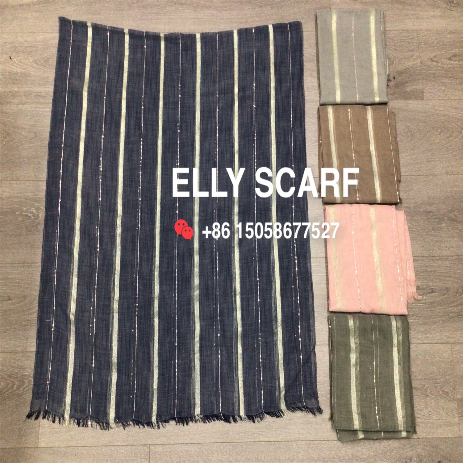 A gold-threaded vertical striped and sequined woven scarf detail image 1