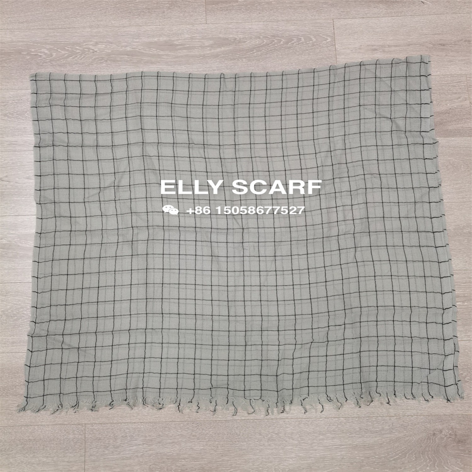 Checked loose wool scarf detail image 1