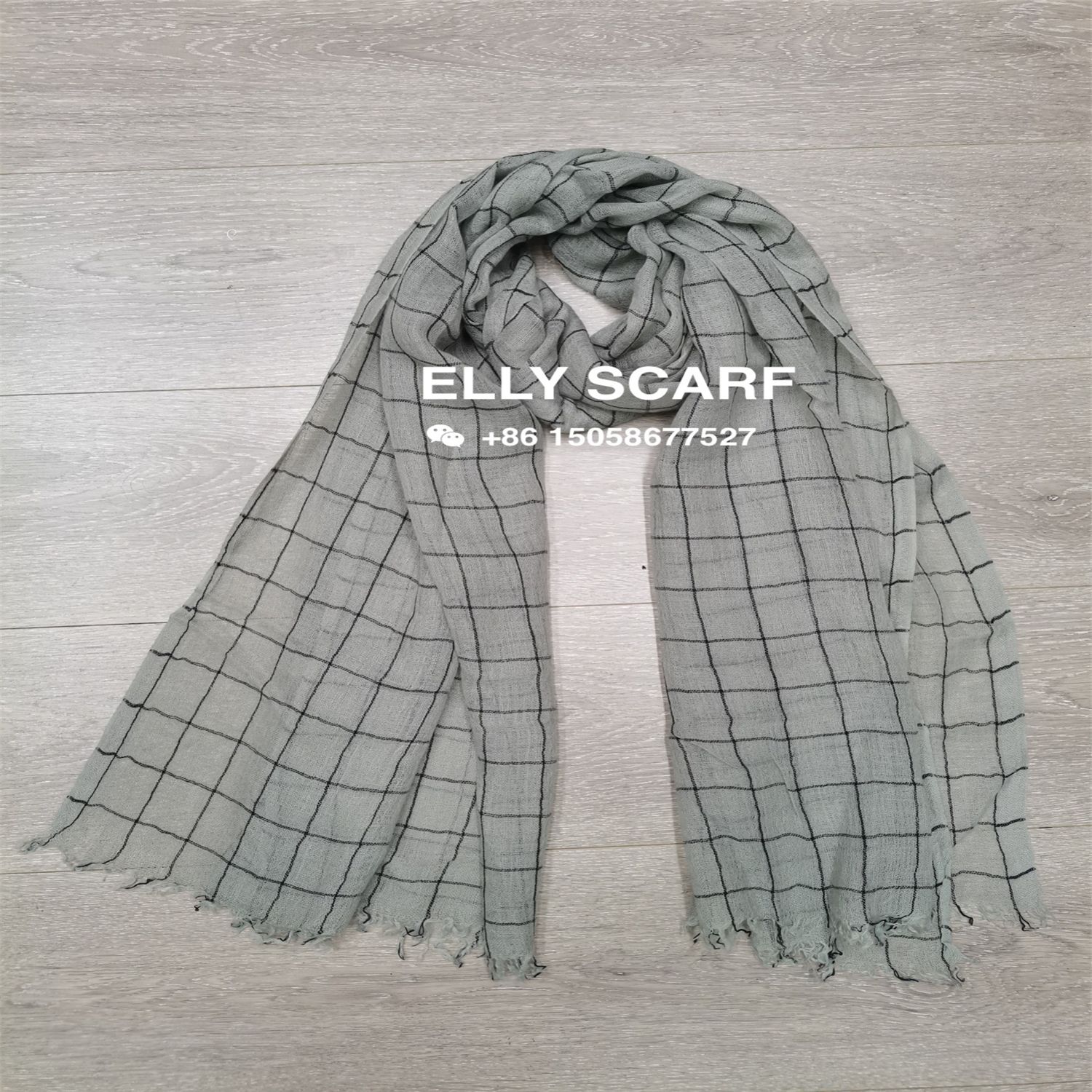 Checked loose wool scarf details Picture