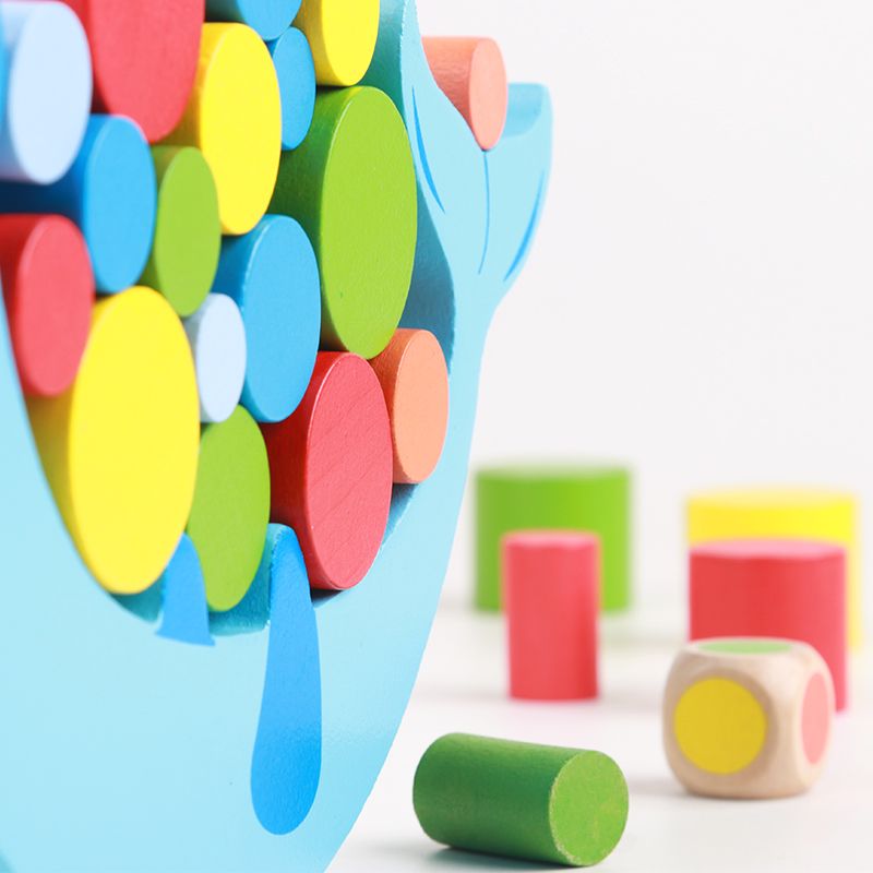 The wooden dolphin balance toy is highly entertaining with rich colors. It can exercise babies' hand-eye coordination, visual ability, logical thinking ability, and early education enlightenment training. It is a parent-child game details Picture