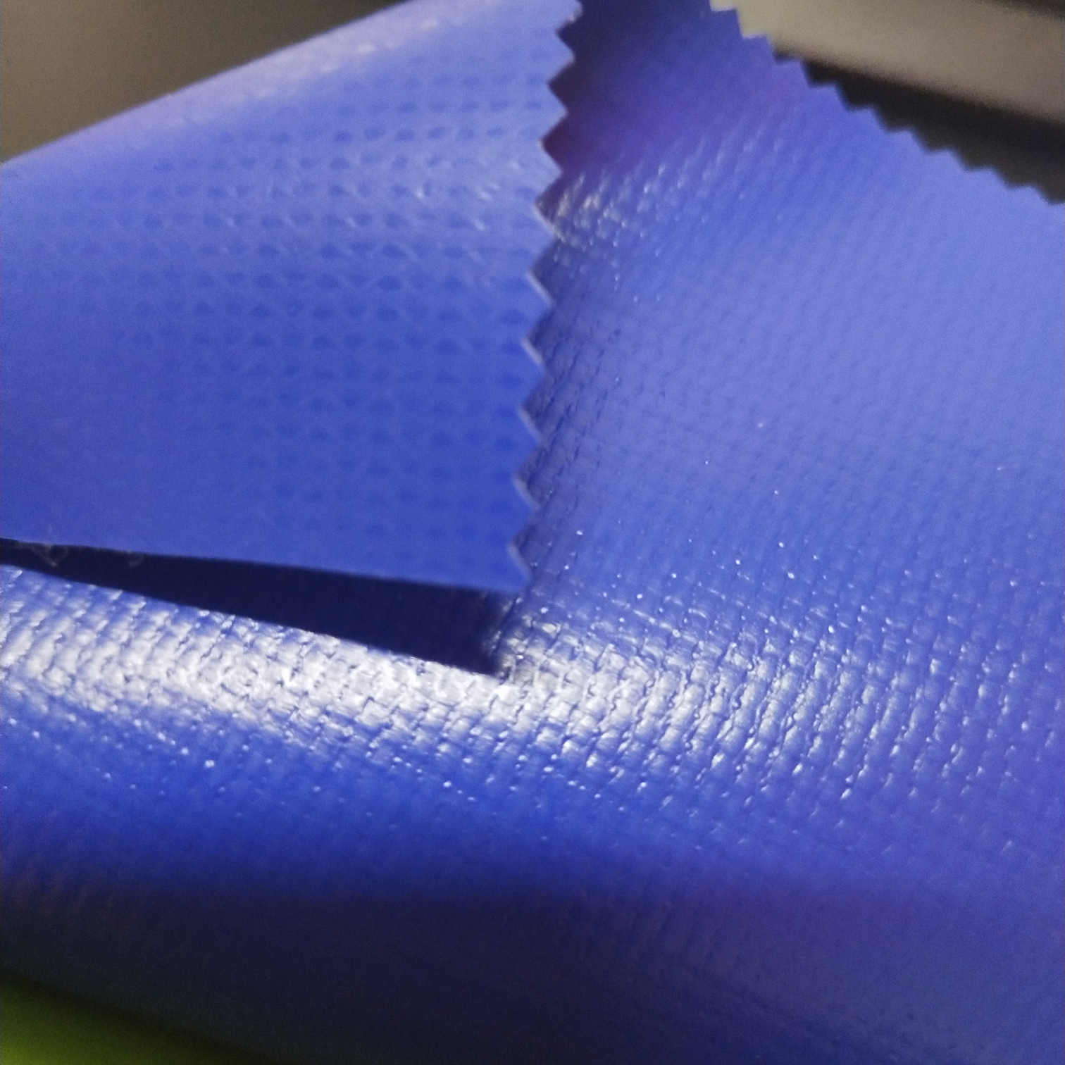 Deep blue PVC mesh fabric laminated with knife-scratched fabric, luggage fabric, and special fabric for sports goods