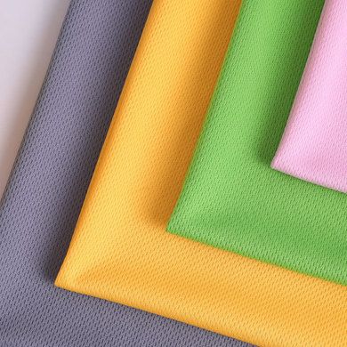 Stock 75D polyester quick drying bird's eye cloth moisture absorbent sweat sweat sportswear fabric high F bird's eye mesh cloth millet cloth Application Scenario