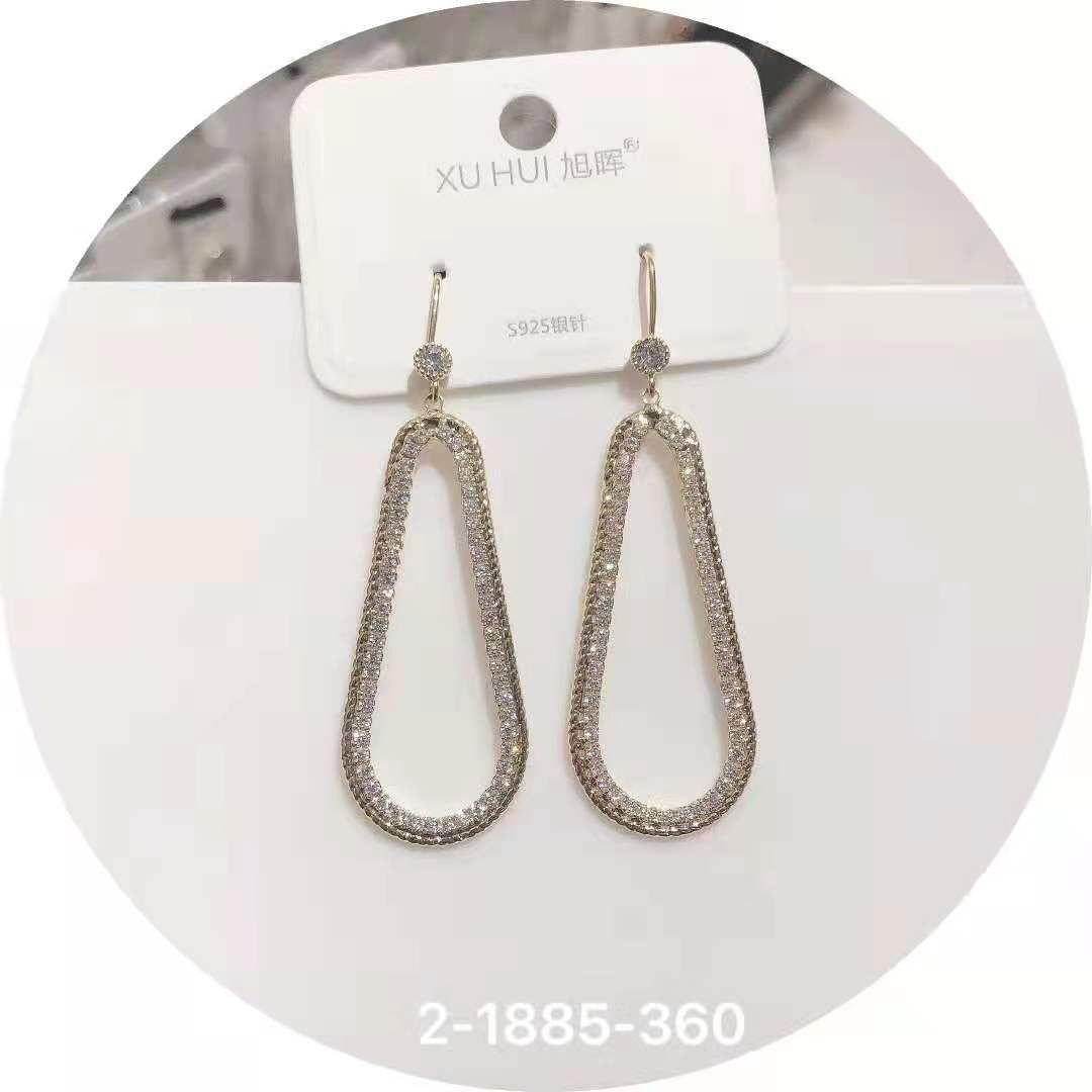 Different row of zircon earrings