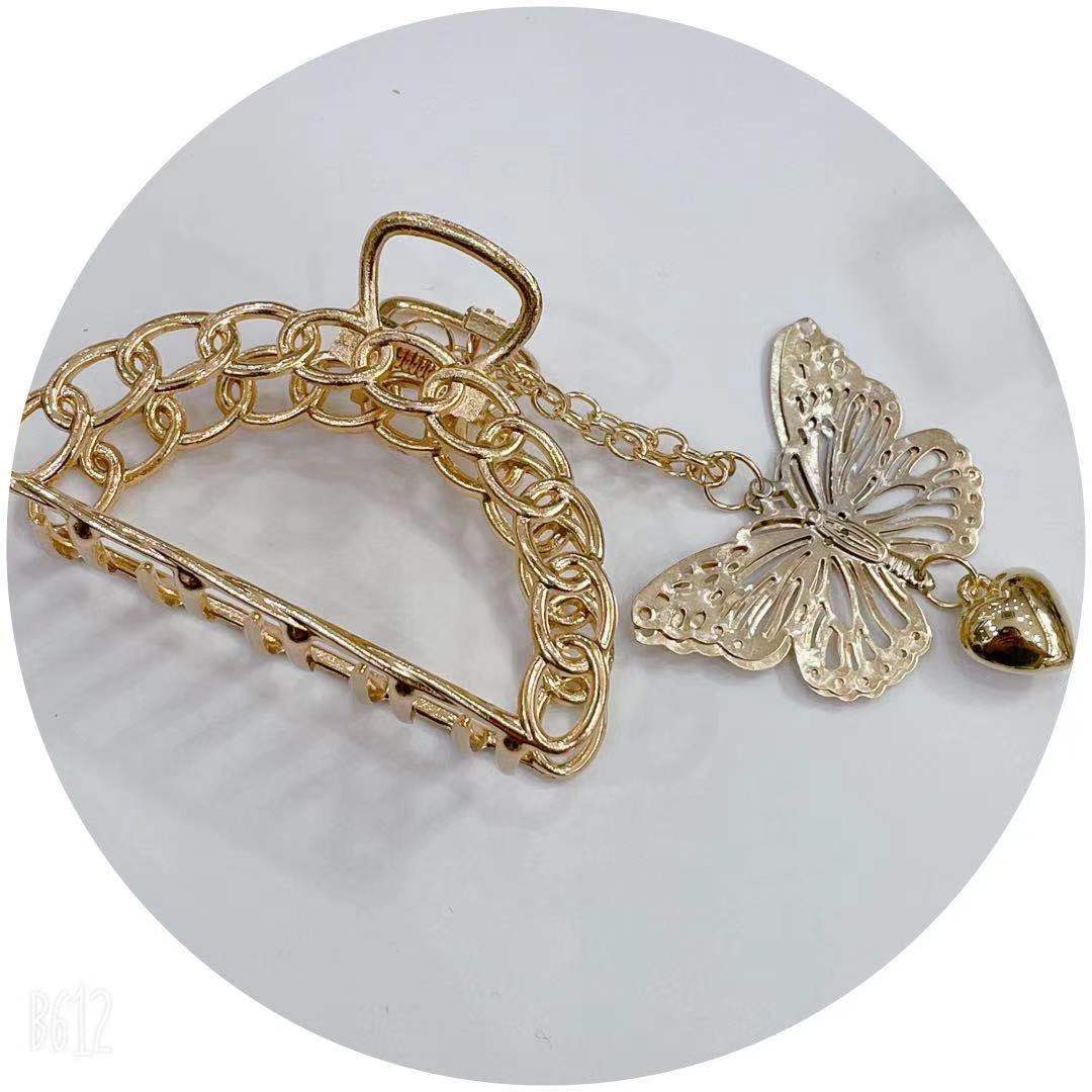 天意饰品 网红爆款 女士时尚高端    合金挂蝴蝶链条爪    抓夹金