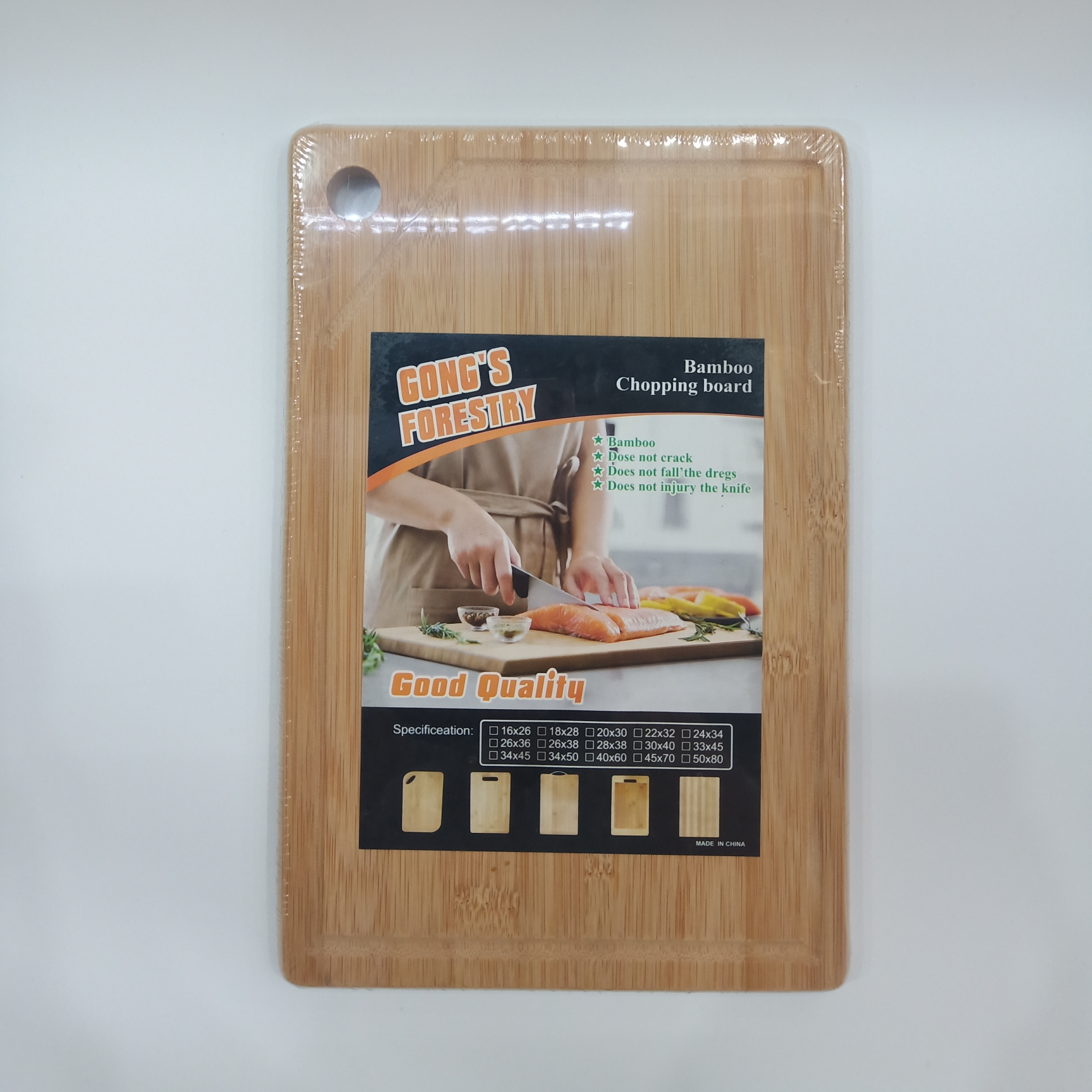 Round-hole carbonized cutting board