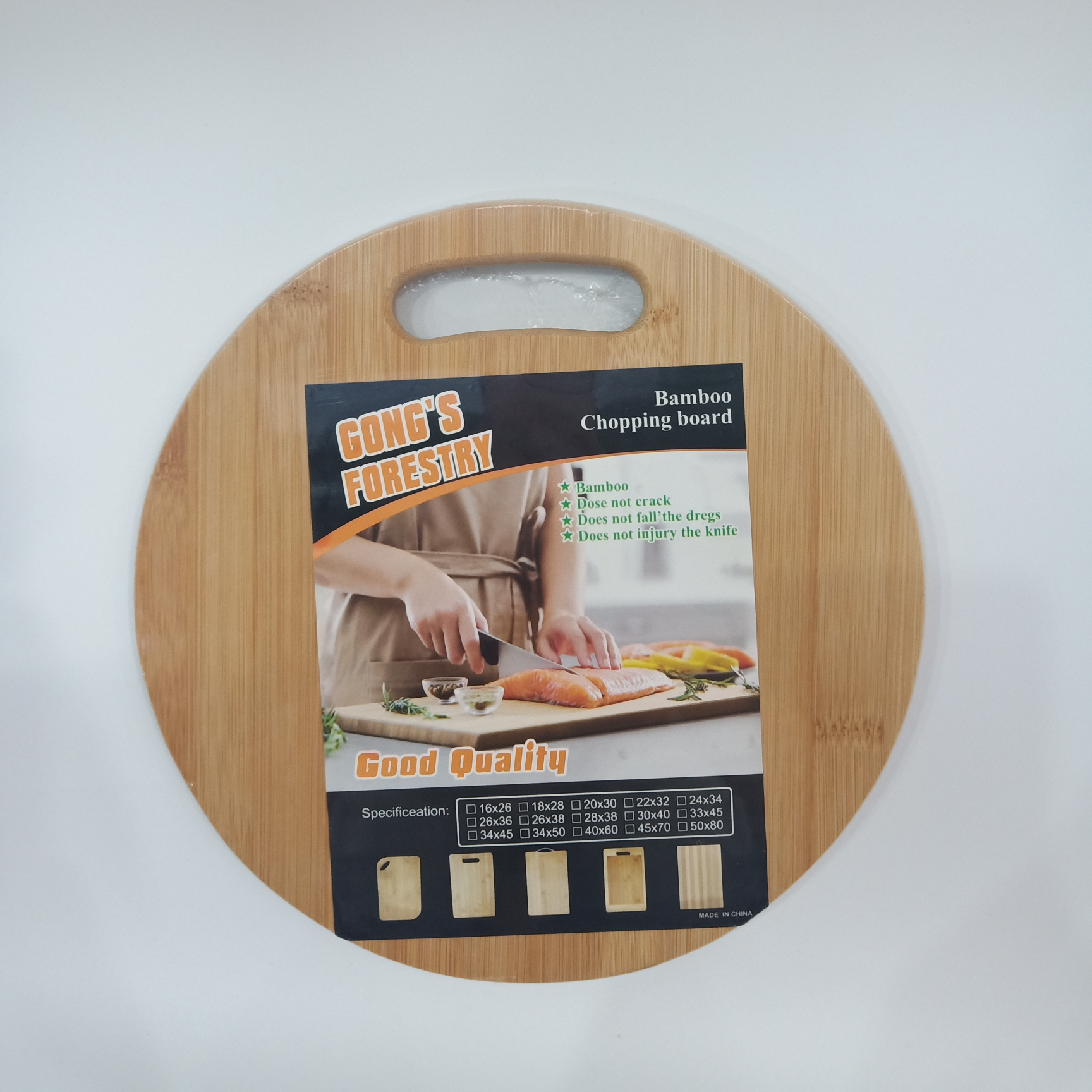 Hand-held round cutting board