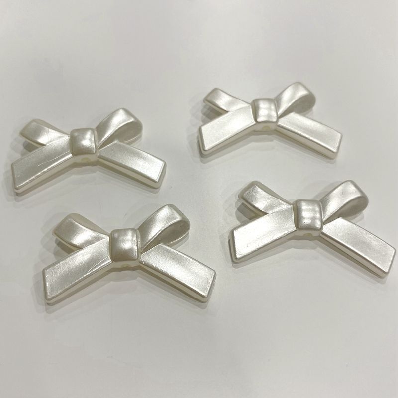 New imitation pearl bow tie, bow, AB colorful fork, cross knot clothing, mobile phone case decoration accessories, DIY handcrafted bracelets, necklaces, essential accessories Application Scenario