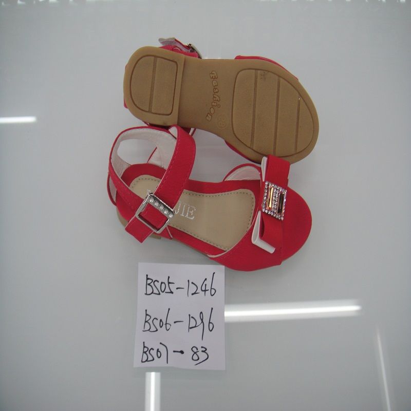 The children's sandals are made of shiny leather and are exquisitely crafted