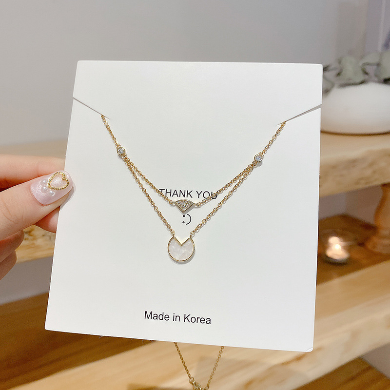 Korean bestseller pearl copper necklace, female Internet celebrity retro zircon choker sweater chain, design sense pendant wholesale 6980 Item Picture