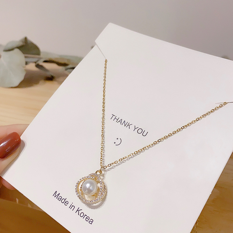 Korean bestseller pearl copper necklace, female Internet celebrity retro zircon choker sweater chain, design sense pendant wholesale 57980 Application Scenario