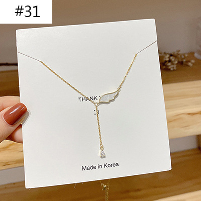 Korean bestseller pearl copper necklace, female Internet celebrity retro zircon choker sweater chain, design sense pendant wholesale 56879