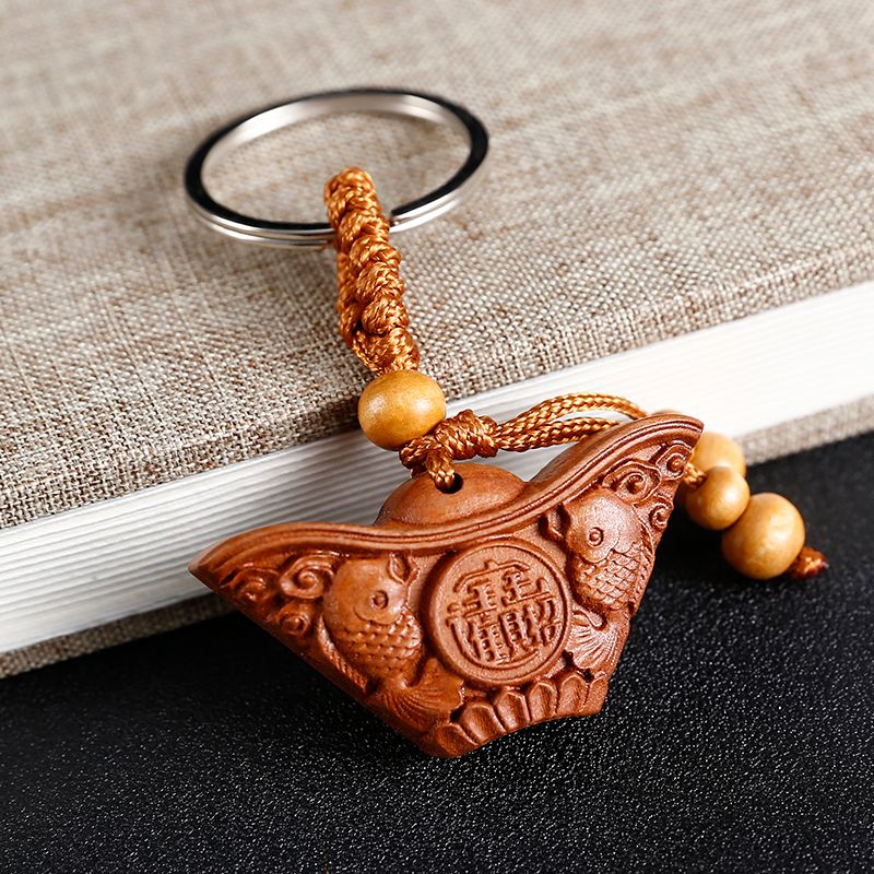 Flat keychain with treasure ingot