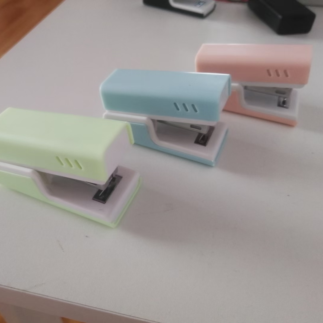 Small stapler, hole puncher, nail screwdriver