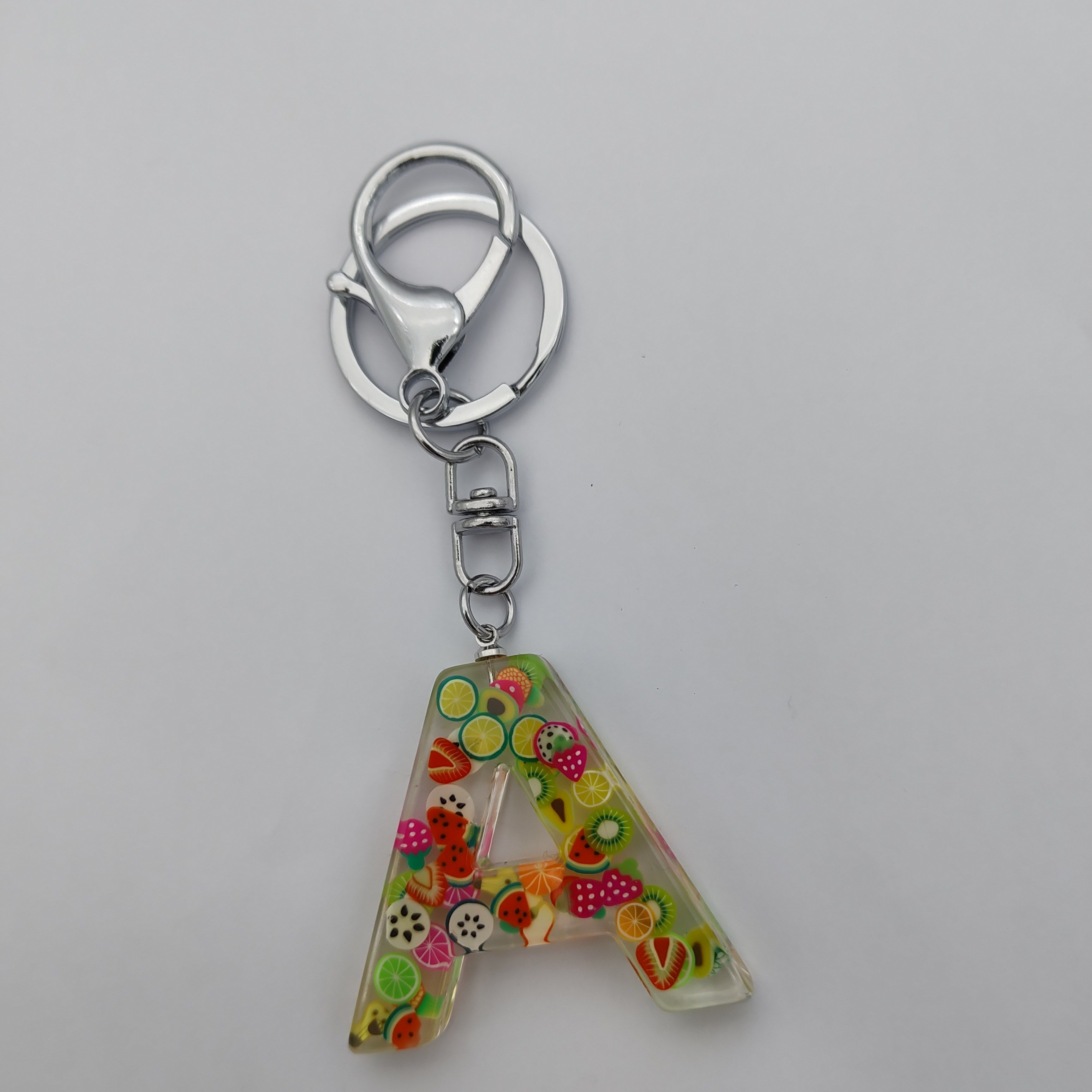 Letter keychain, Amazon cross-border bestseller, fruit slice crystal resin, creative keychain, letter resin customization Specification image