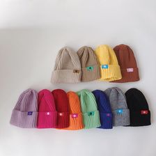 秋冬季新款儿童针织帽保暖帽笑脸贴标时尚休闲韩版纯色套头毛线帽