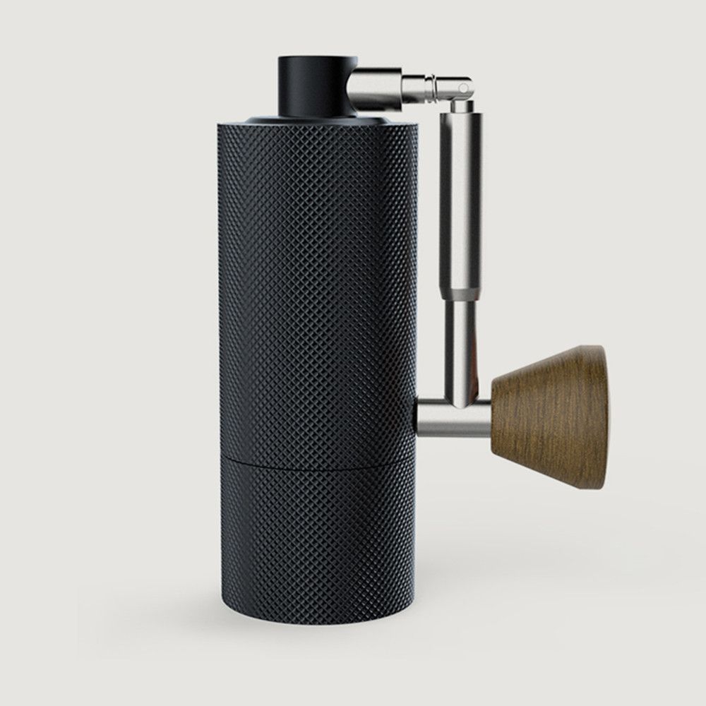 The Chestnut Nano portable folding hand-cranked coffee grinder is a household coffee bean grinder with a central axis positioning, foldable, portable and pocket-fitting stainless steel Nano coffee grinder