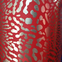 Gold leopard print on red cloth