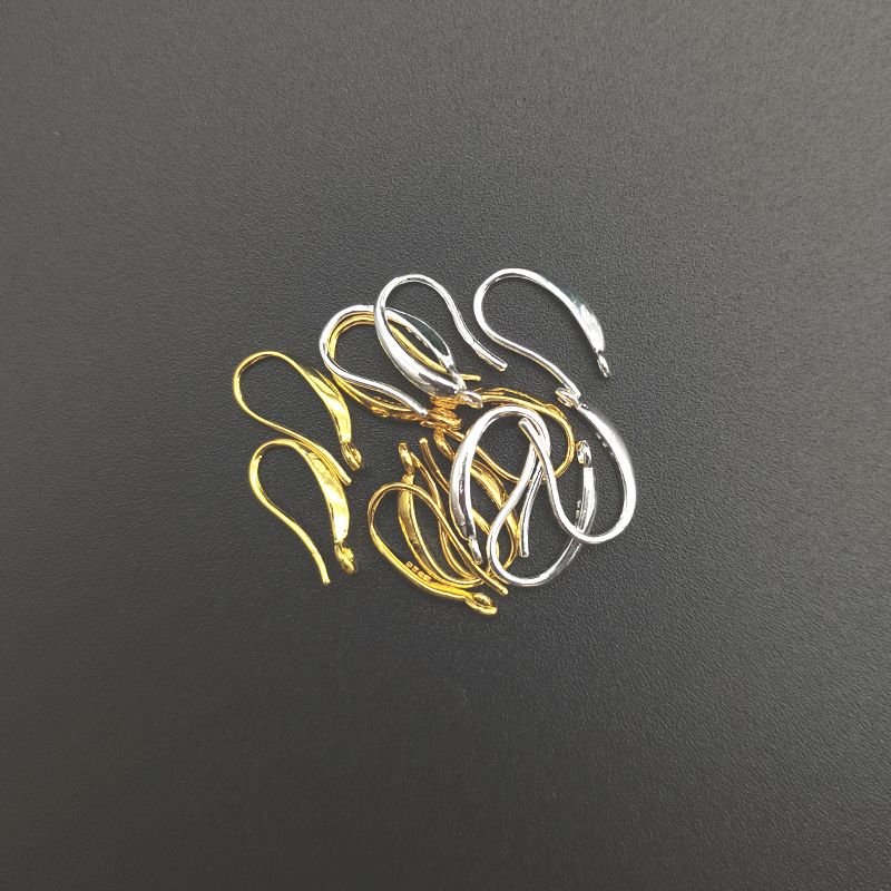 Small copper cross-shaped smooth ear hooks with closed loops