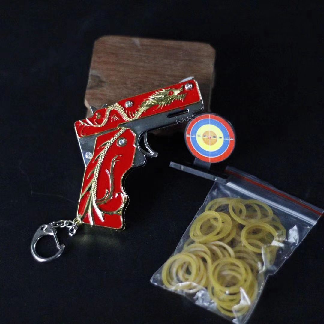 Yunling Toys' 7 cm folding rubber band gun zinc alloy toy can launch rubber bands to give to friends as festival gifts. It's an excellent quality product details Picture