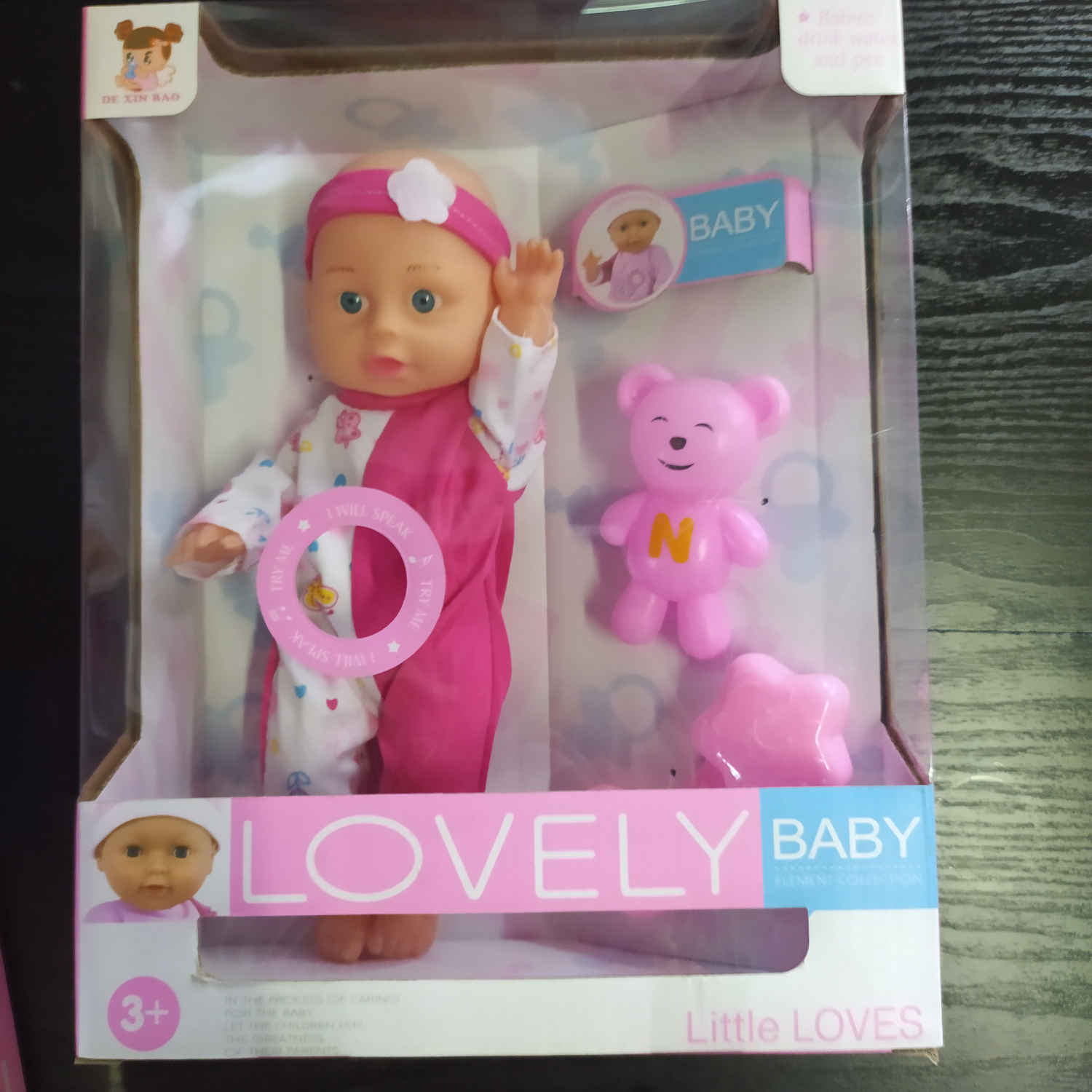 A 10-inch male doll peeing the baby