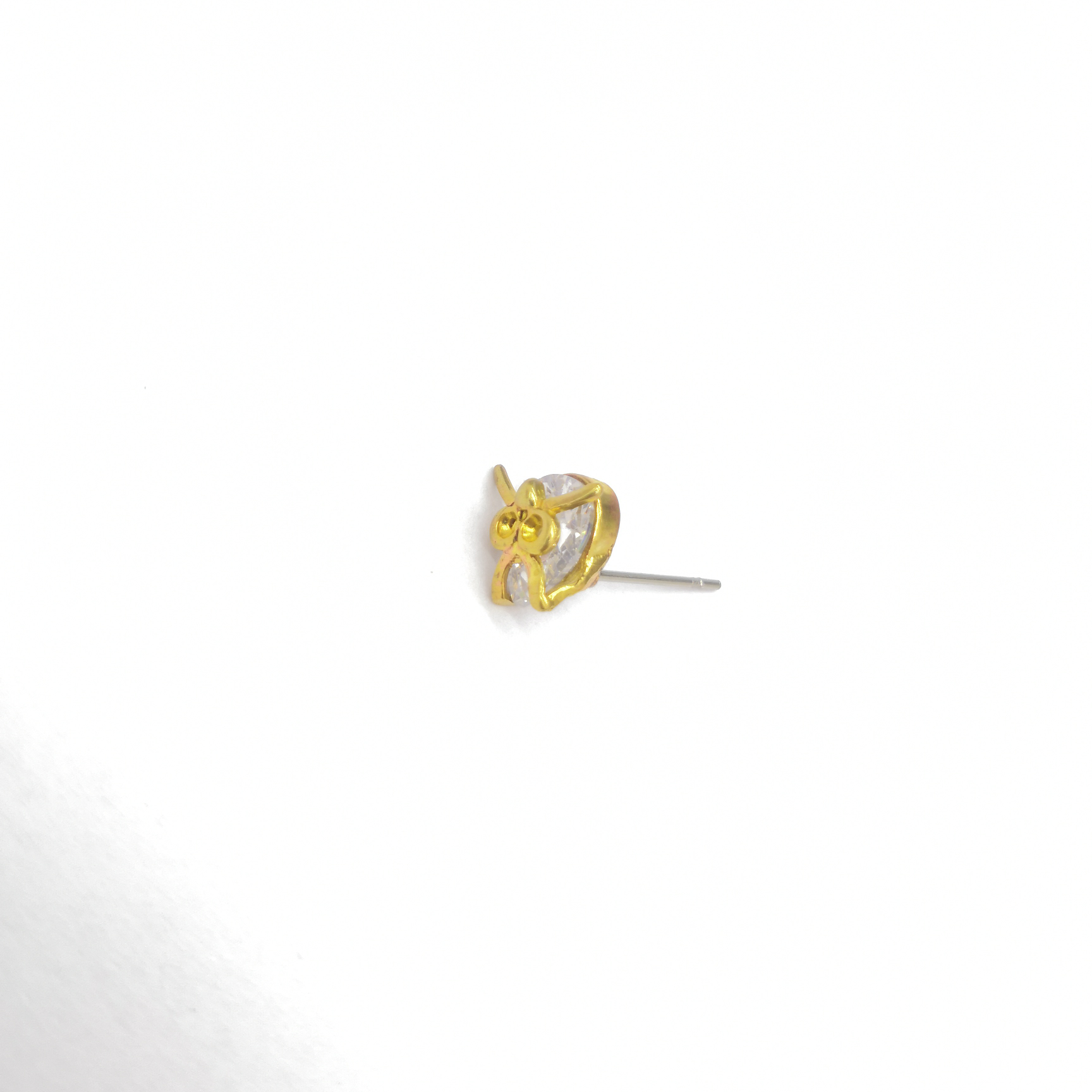 Cast-copper stud earrings with diamonds