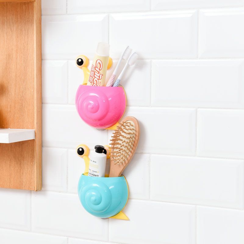 New fashionable multi-functional cochlear powerful suction cup toothbrush holder, creative multi-functional bathroom toothbrush storage rack, paper card Application Scenario