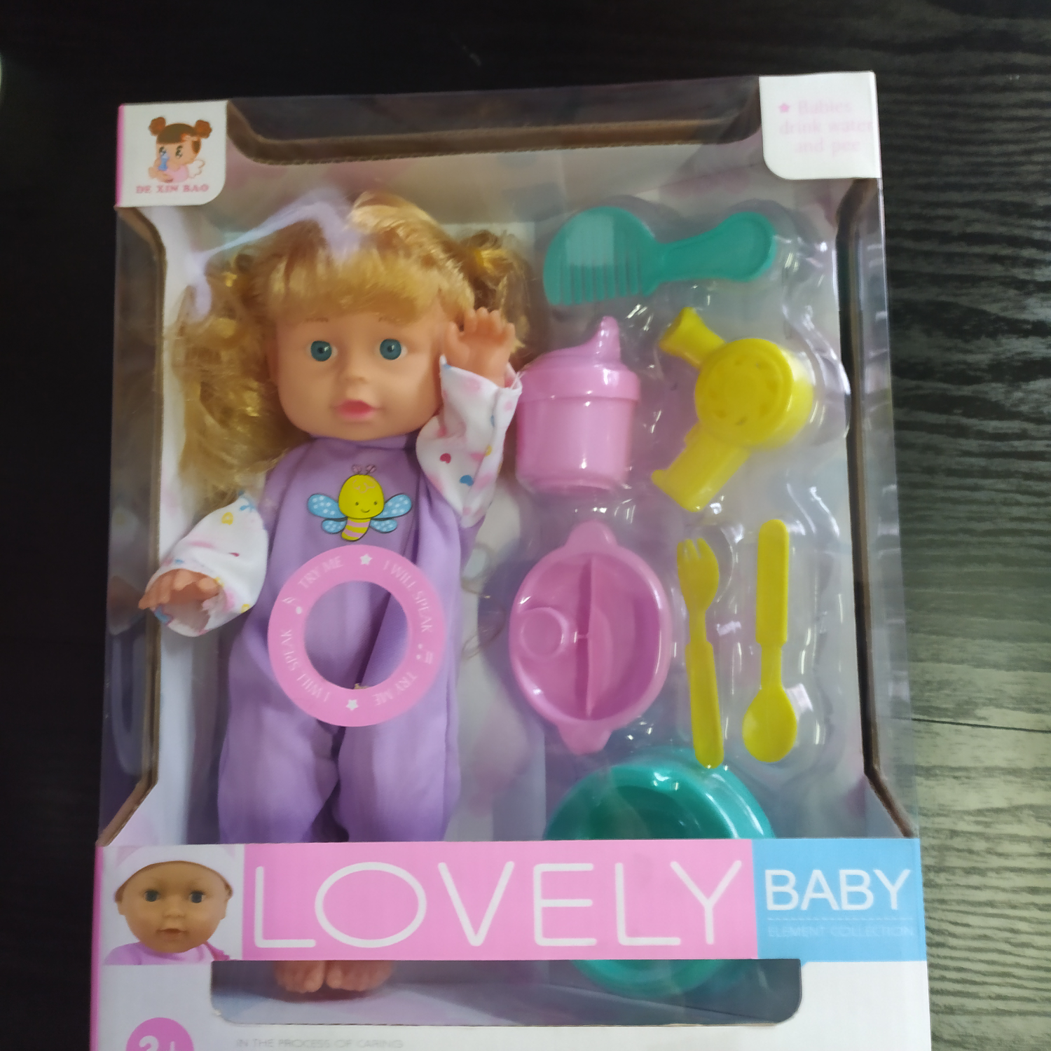 A 10-inch girl doll peeing the baby