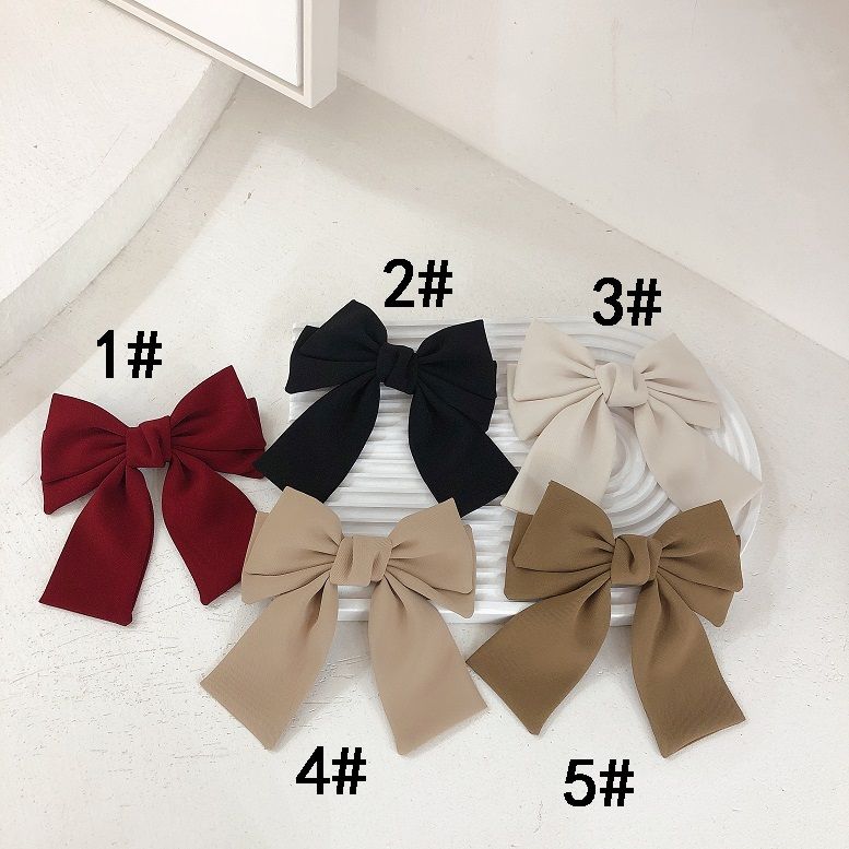 Plain-colored flowing hair clips