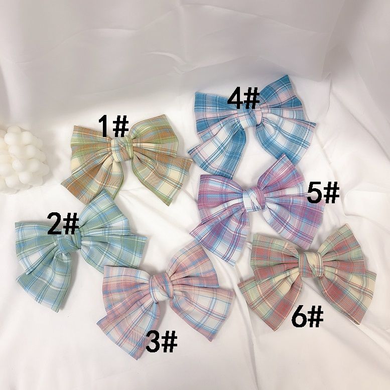 Checkered bow hairpin