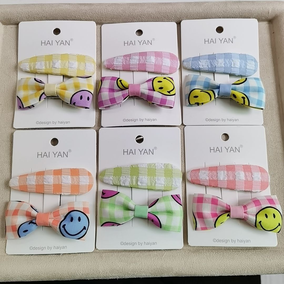 Smiling face combination hairpin