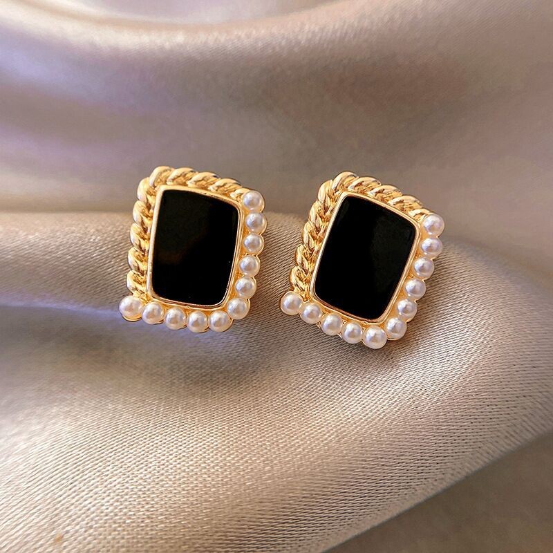 European and American alloy inlaid pearl oil drip process ladies' simple design stud earrings detail image 3