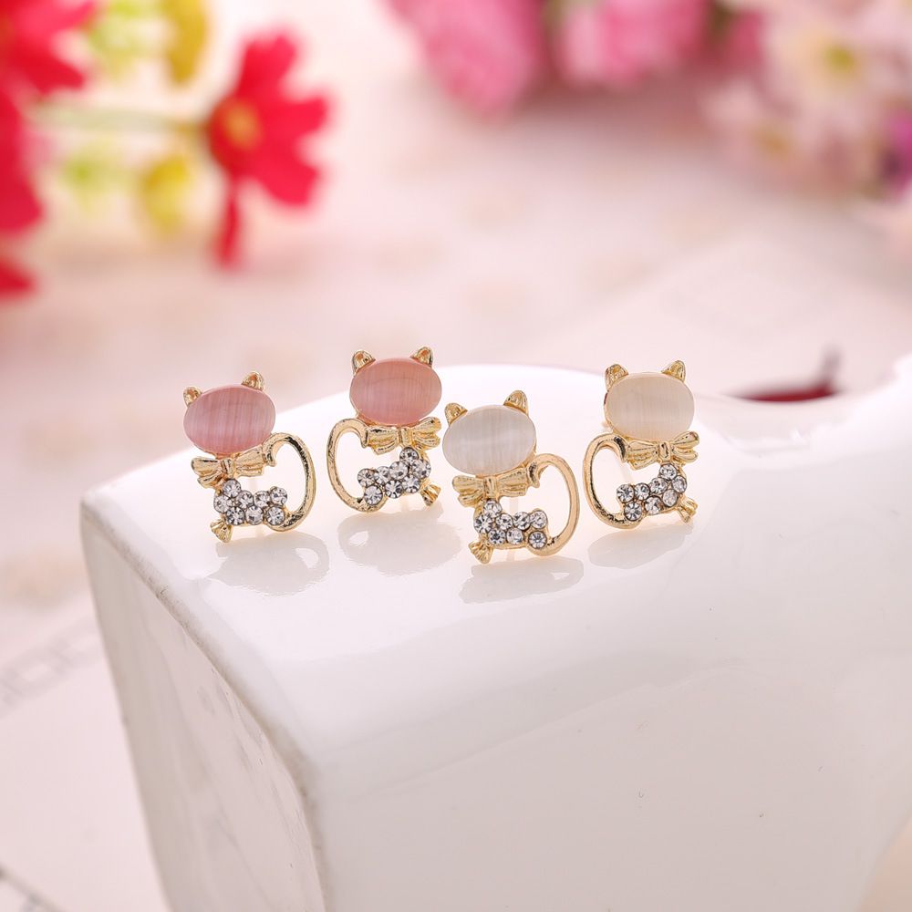 Korean version of small cat inlaid with cat's eye stone water diamond alloy animal women's ear stud