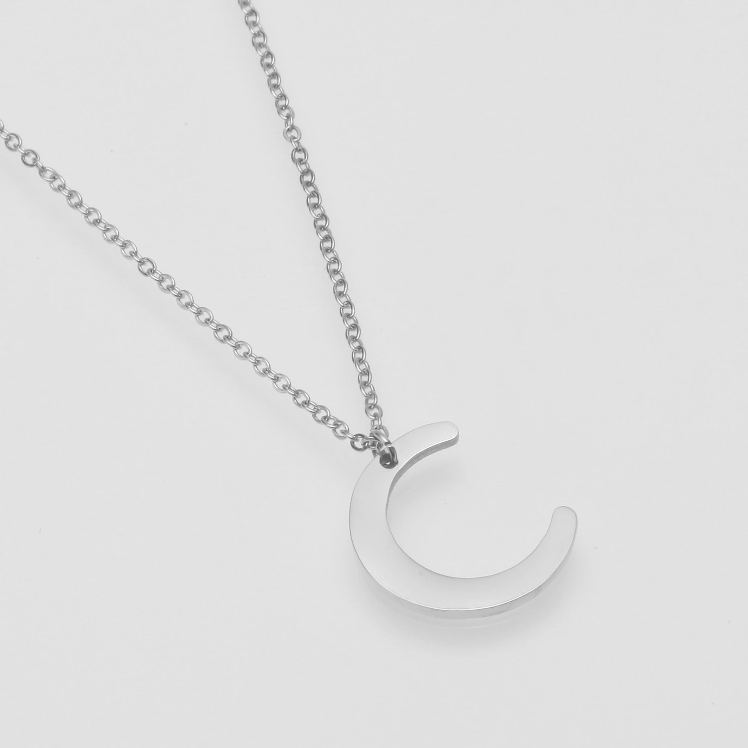 European and American fashionable alloy moon-shaped pendant necklace with a cold and elegant design style for women detail image 3