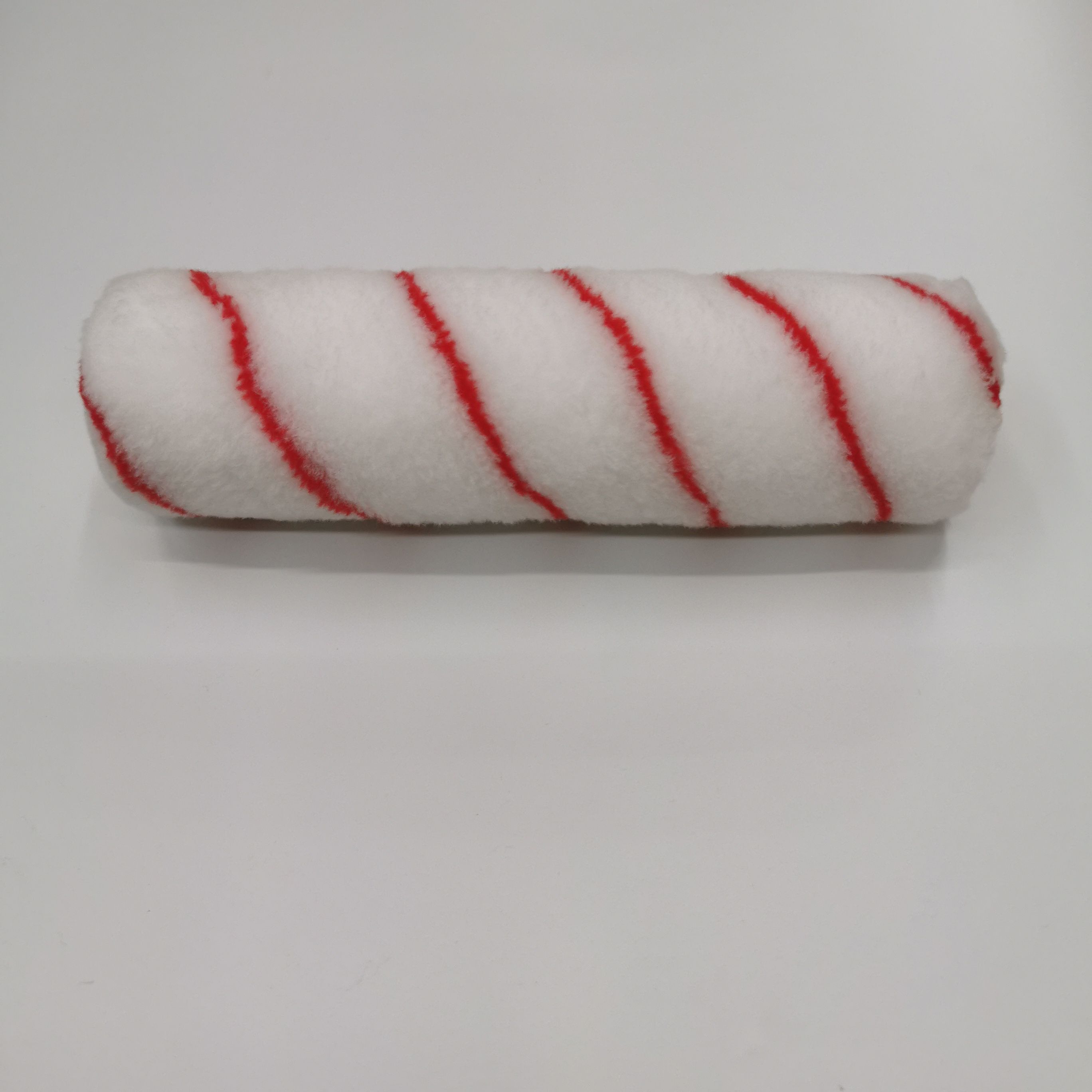 A 9-inch roller is used for painting and applying red stripes on household walls
