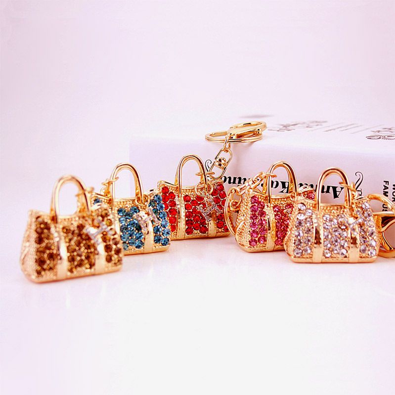 Fashionable and light luxury women's handbag inlaid with rhinestones, car keychain, women's bag accessories