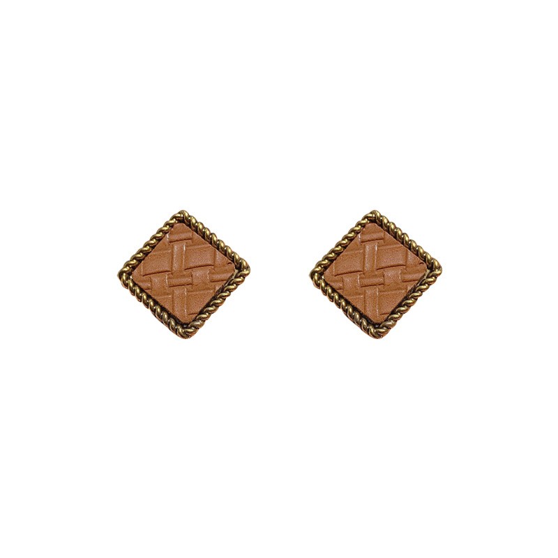 The base of the European and American light luxury alloy is pasted with artificial leather geometric lady's ear studs detail image 1