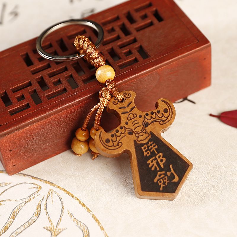Peach wood engraved flat keychain wooden sword