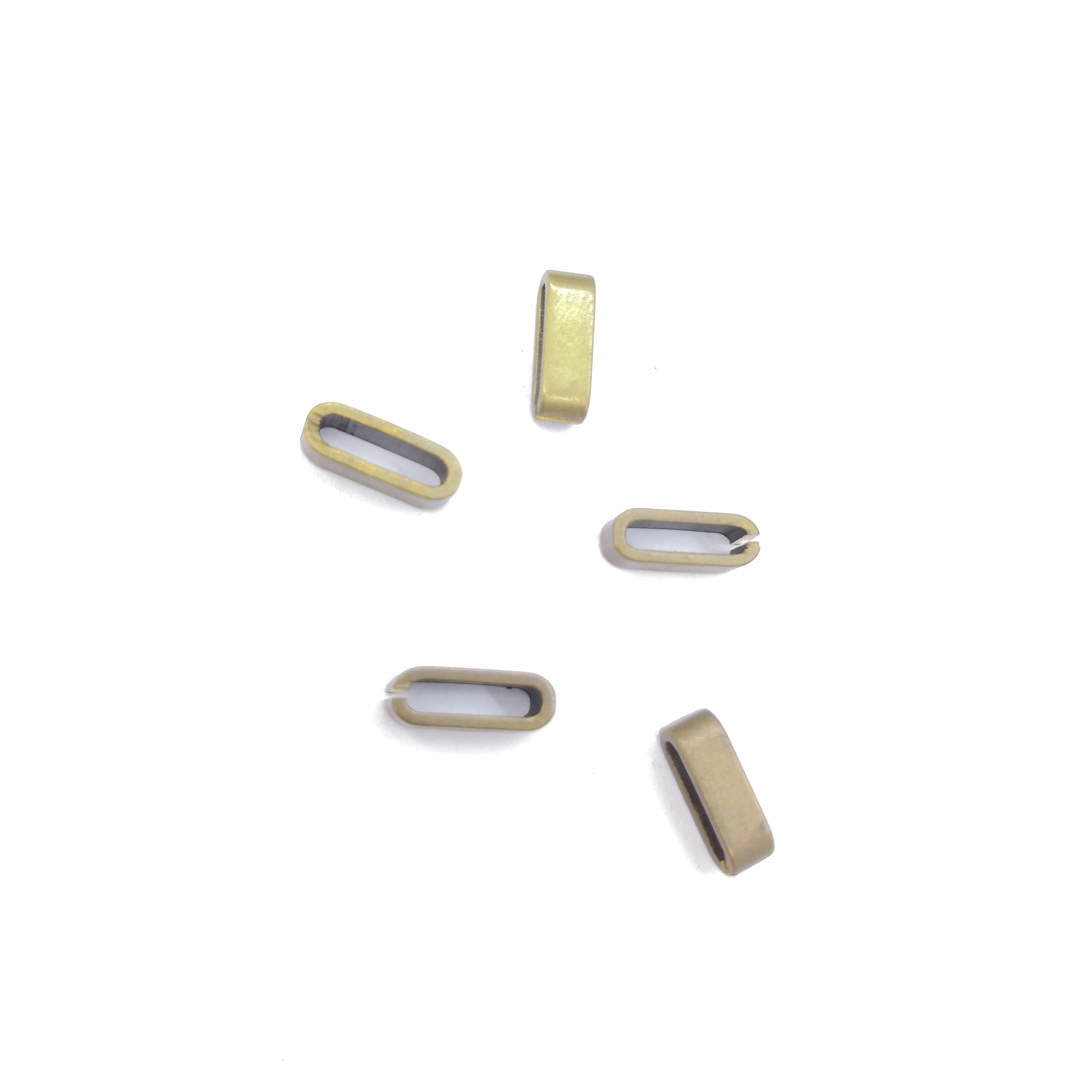 One end of the flat oval copper coil is cut off