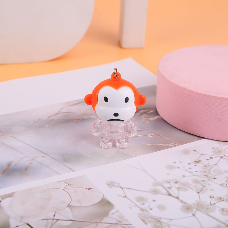 Creative summer new children's plastic toys: Glowing little monkey keychain pendant, up and down switch iron buckle chain, glowing toy, small gift, tall electronic toy 1 Specification image