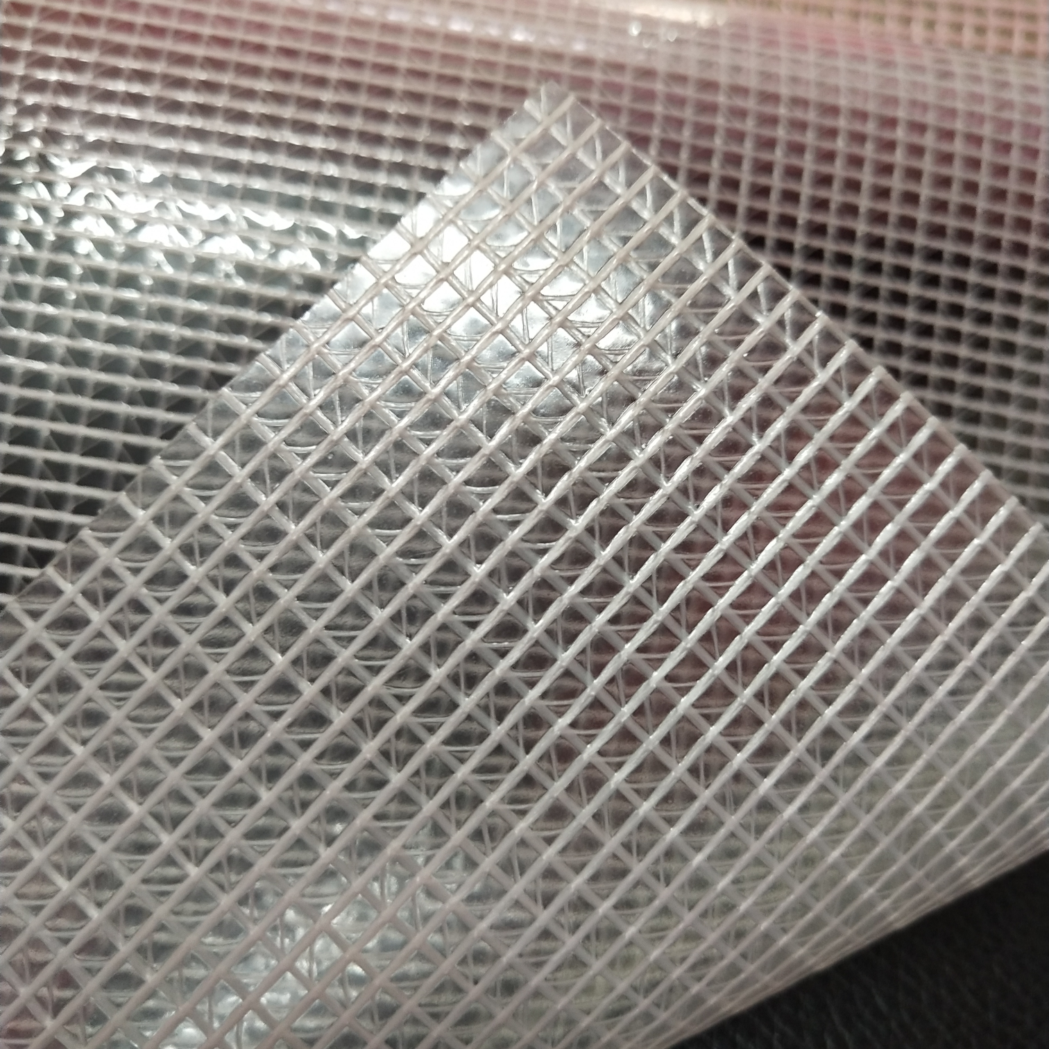 High-quality white 0.27mm thick transparent PVC mesh fabric is suitable for various machine covers, furniture covers, file bags, storage boxes and special fabric for cosmetic bags