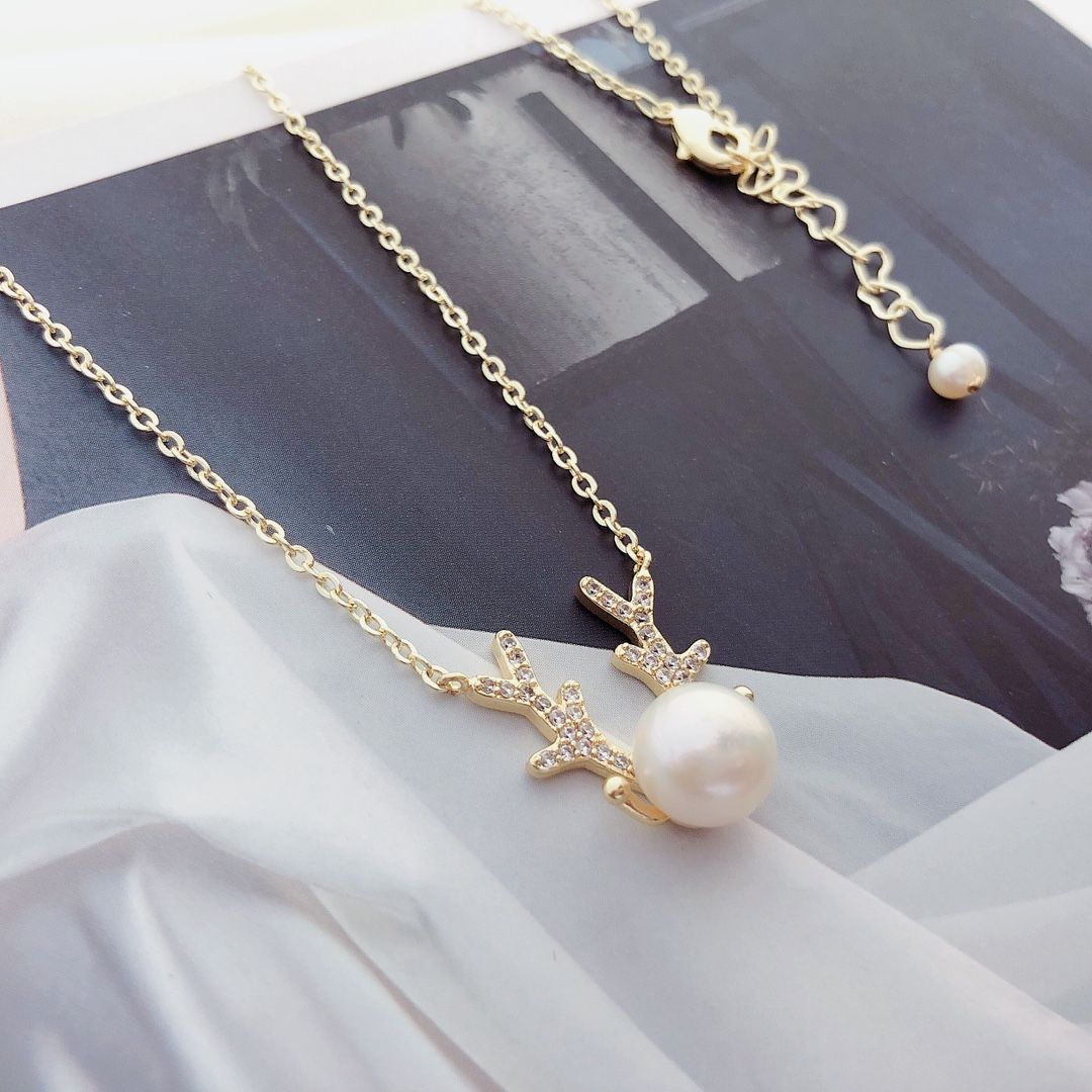 الغزال لديه قلادة اللؤلؤ الخاصة بك Specification image