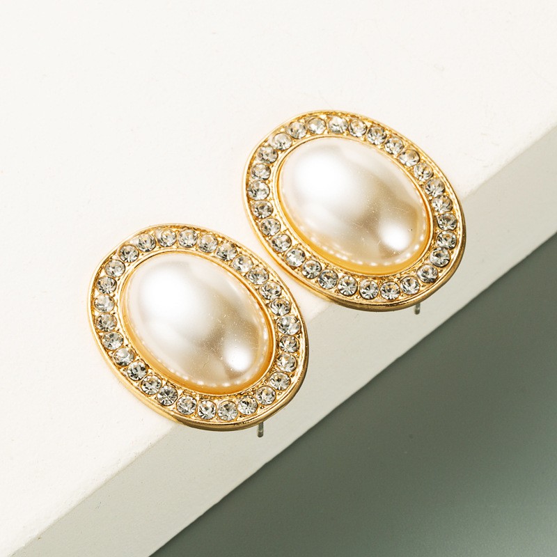 European and American fashionable alloy inlaid pearl rhinestone women's light luxury stud earrings detail image 1
