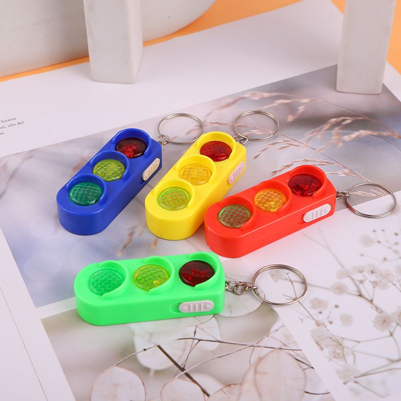 The store has created a new type of children's plastic traffic light keychain