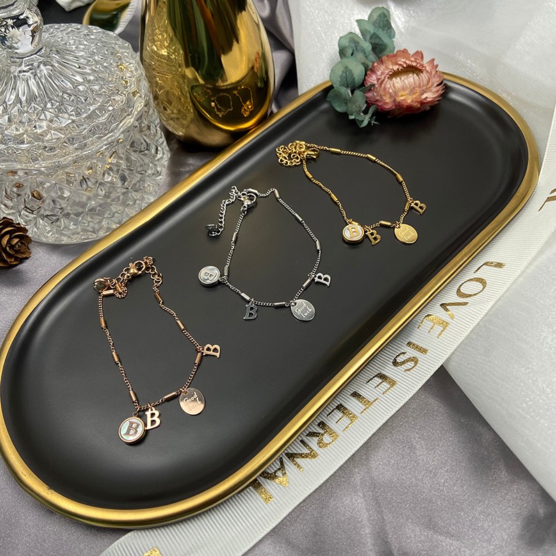 字母吊坠母贝钛钢手链韩版字母批发饰品腊梅详情图9