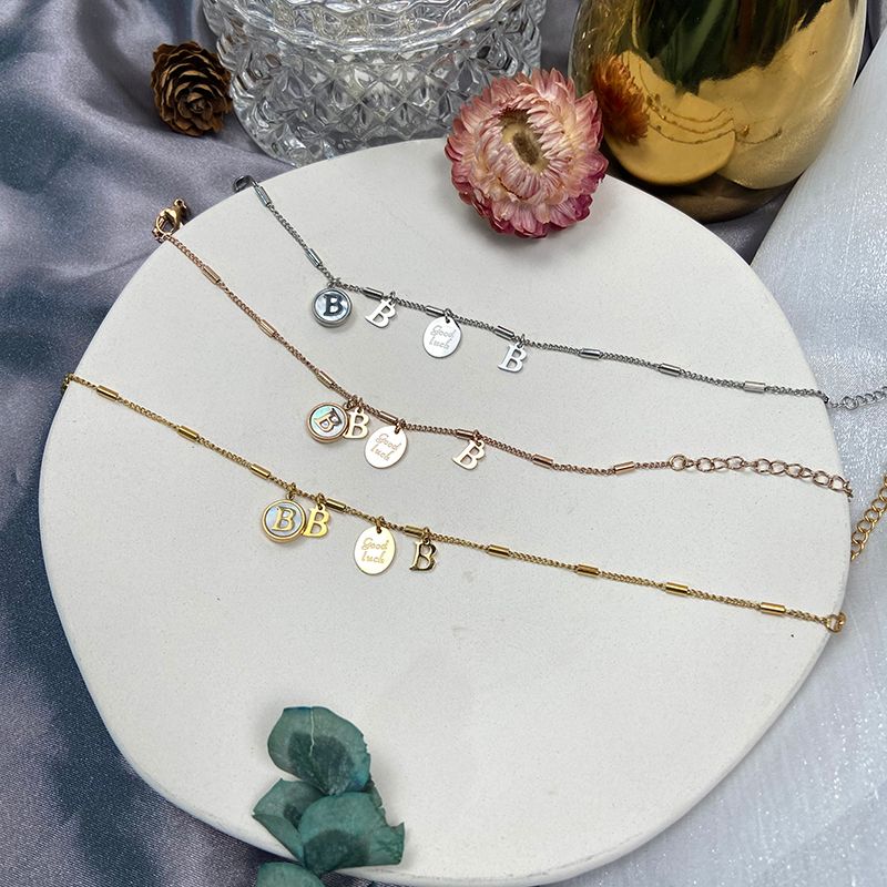 钛钢手链/字母手链/母贝手链细节图