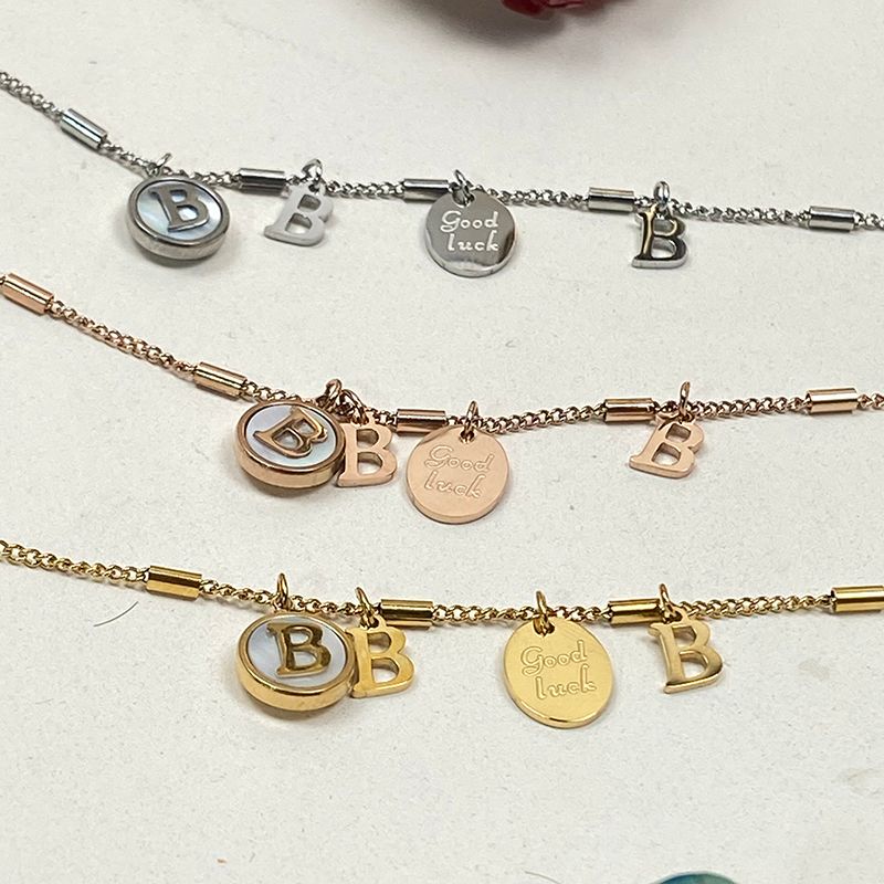 钛钢手链/字母手链/母贝手链产品图